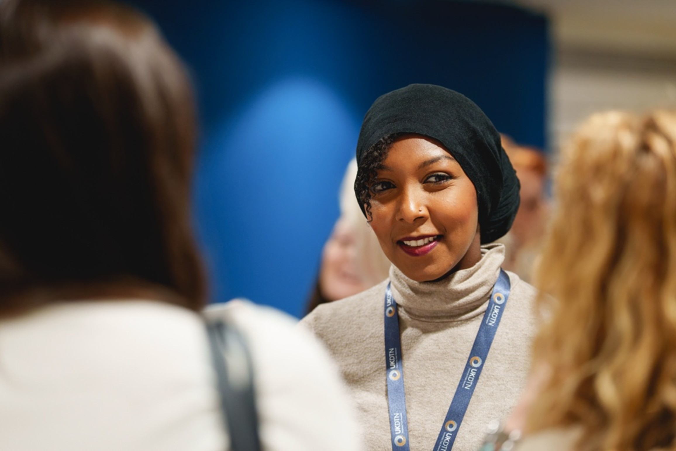UKDTN-woman-with-lanyard